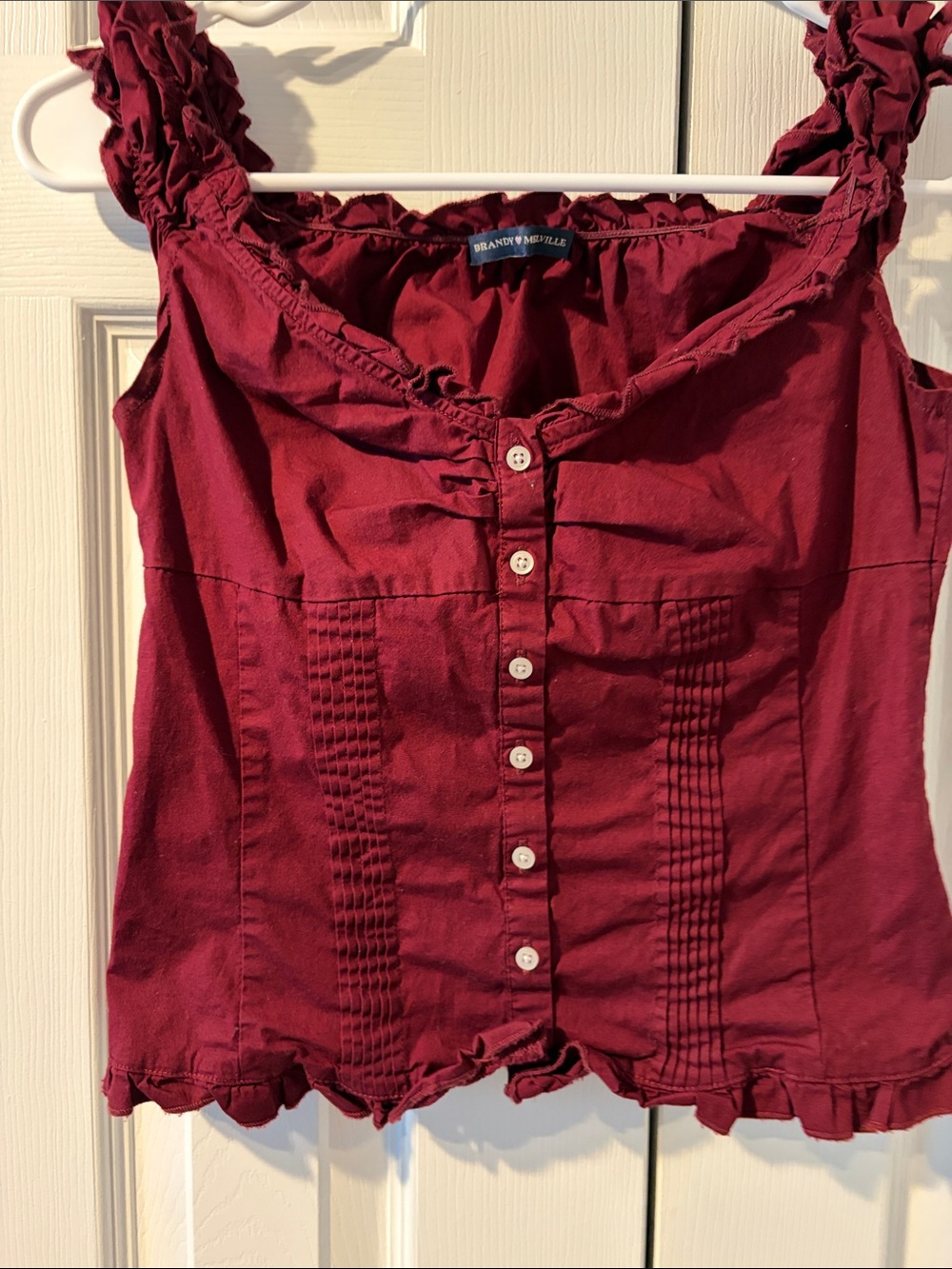 Brandy Melville wine red ruffle button-front camisole